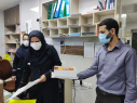 گزارش تصویری پخش شیرینی به مناسبت اعیاد شعبانیه بین همکاران بیمارستان آیت الله طالقانی اراک